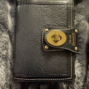 Coach Black Leather 2026 Calendar and Card Slots with Gold Clasp for closure.